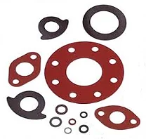 Red and black cut gaskets of various shapes